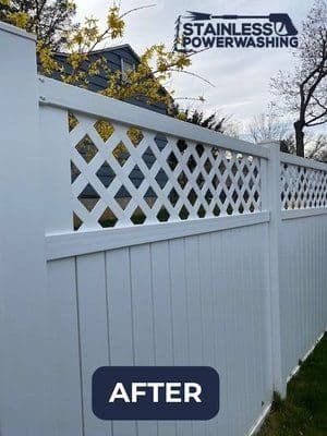 Clean white fence with lattice after power washing, showcasing enhanced brightness and clarity.