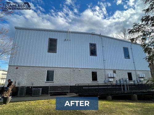 Clean, renovated commercial building exterior after power washing, showcasing improved appearance.
