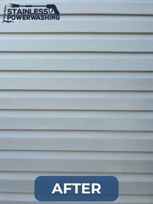 Clean, newly power-washed vinyl siding, showcasing a bright, fresh appearance.